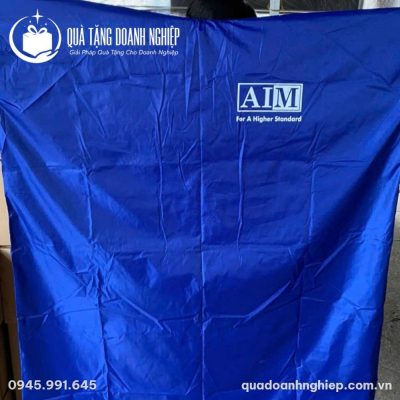 Áo Mưa Bít In Logo Vải Dù Vân Tổ Ong Màu Xanh Quà Tặng Doanh Nghiệp