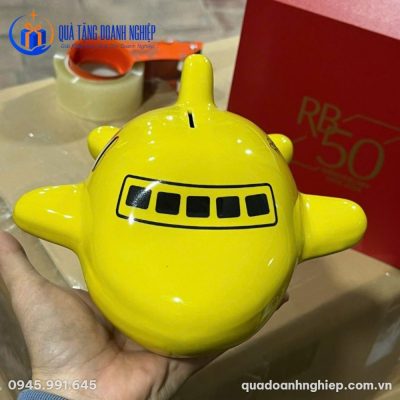Heo Đất Dáng Máy Bay Màu Vàng In Quà Tặng Doanh Nghiệp