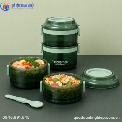 Hộp cơm HC-04 khi tháo rời các tầng chứa thực phẩm đa dạng cùng thìa đi kèm tiện dụng